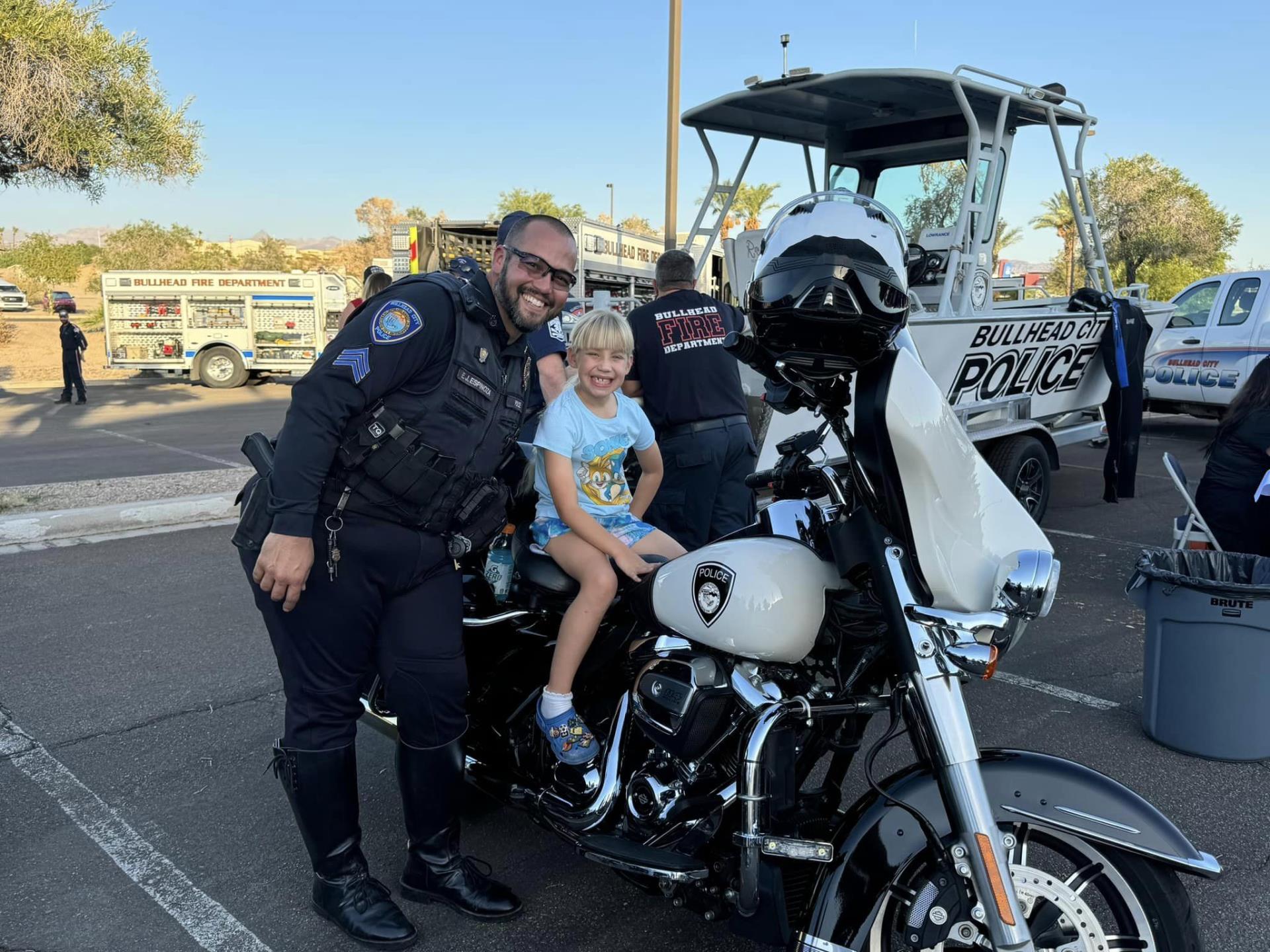 kid on police motorbike